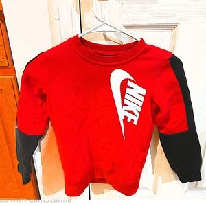 Size 5-6 Nike Sweatshirt red with black sleeves and white Nike swoosh